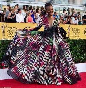 250E7A2900000578-2926150-Having_a_great_time_Lupita_Nyong_o_looked_regal_in_her_psychedel-a-65_1422260908842